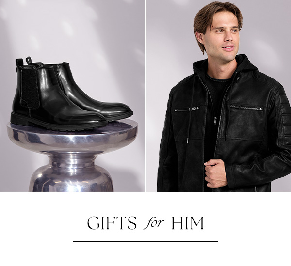 image of a men’s pair of black faux-leather Chelsea boots