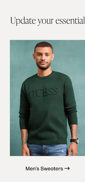 image of a male model in a forest green crewneck sweatshirt with embossed logo