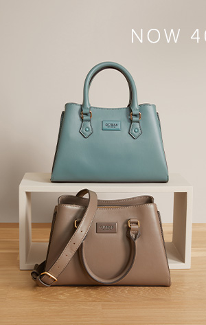 image of two smooth faux-leather satchel bags in brown and teal colorways