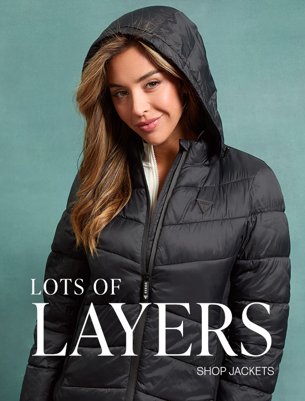 image of a model in black quilted nylon jacket with hood