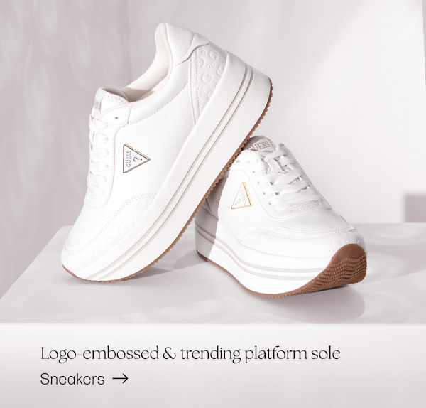 image of a pair of white logo-embossed sneakers with platform sole