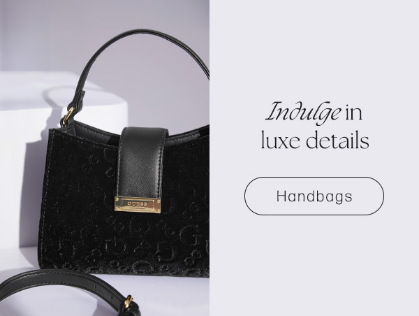 image of a black velvet logo-debossed mini bag