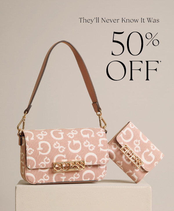 image of a pink and white logo print faux-leather shoulder bag with matching wallet