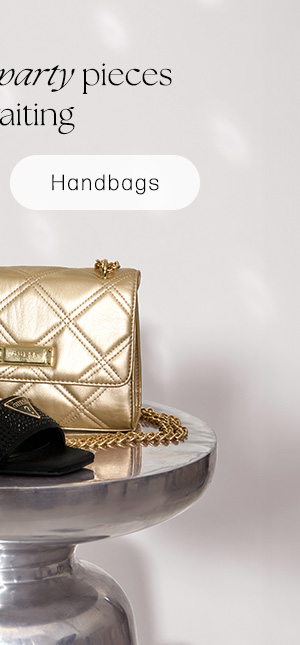 image of a rhinestone studded pair of block heels and gold diamond-quilted handbag