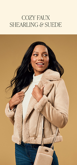 model in a tan faux-suede moto jacket with faux-shearling trim