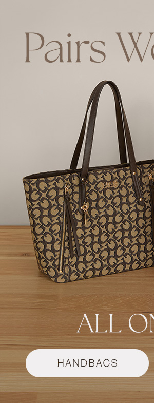 image of a logo print tote bag and slouchy white faux-leather boots